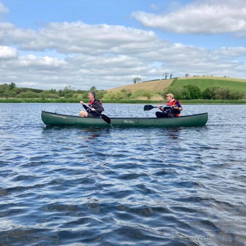 strangford-lough-activity-centre-pair-canoeing-quoile-with-green-hills Canoe Hire