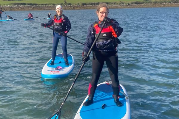 2 Women Sup Paddling Calm Lough