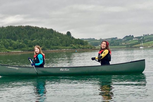 Two Young Women Canoeing Lough