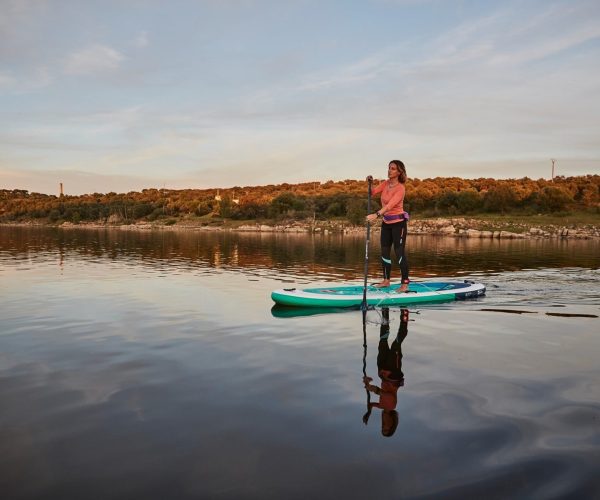 strangford-lough-activity-centre-woman-sup-calm-evening-water